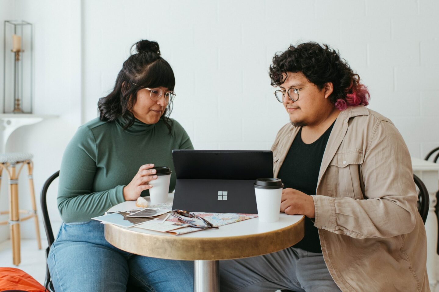 Two people sat talking to one another