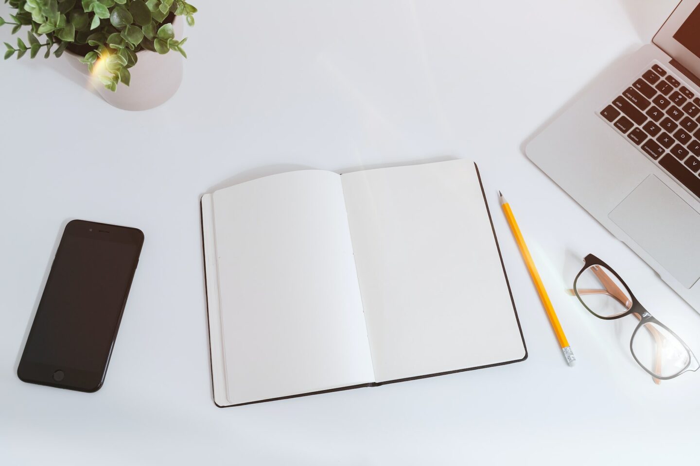 Blank notepad open on a desk